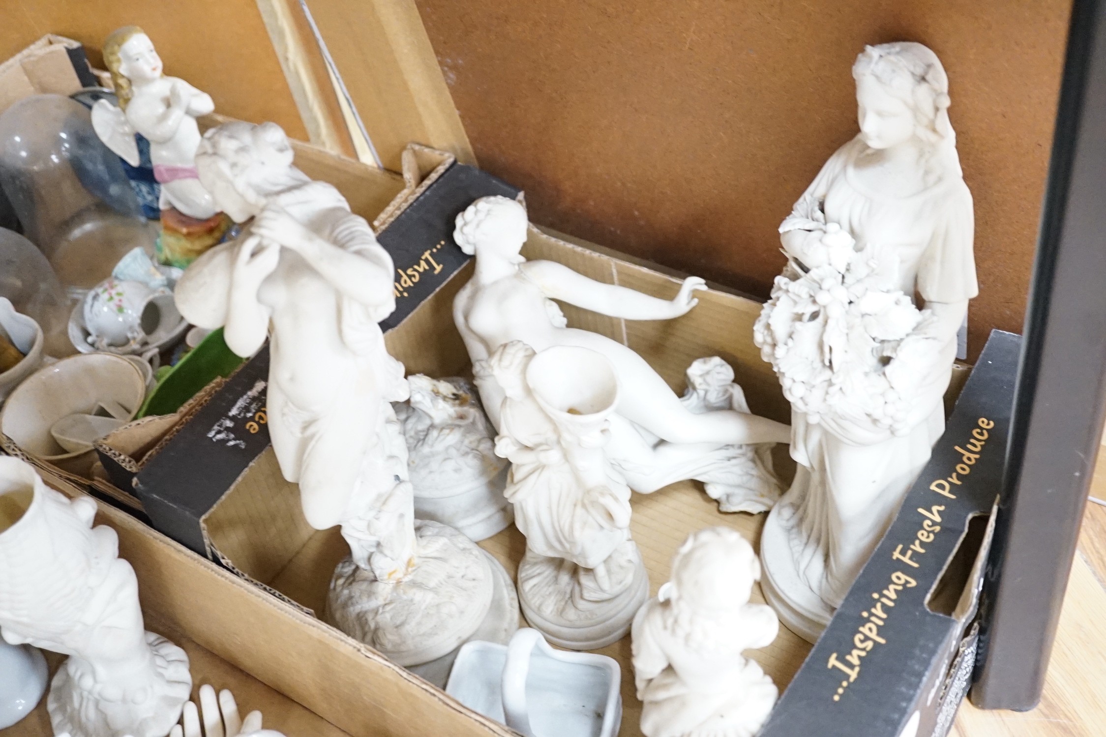 A large collection of mostly 19th century white glazed ceramics, including ring trees, model hands, figurines, vases and other coloured ceramics (five boxes)